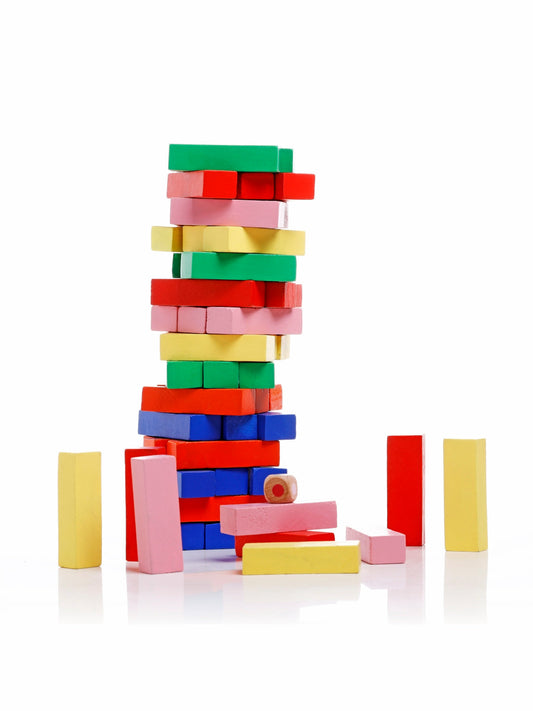 Colorful Wooden Tumbling Tower Game Jenga / Zenga. Puzzle Game for Adults and Kids